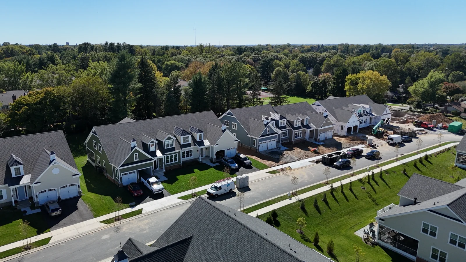 Carriage homes and construction equipment along Villabrook Way