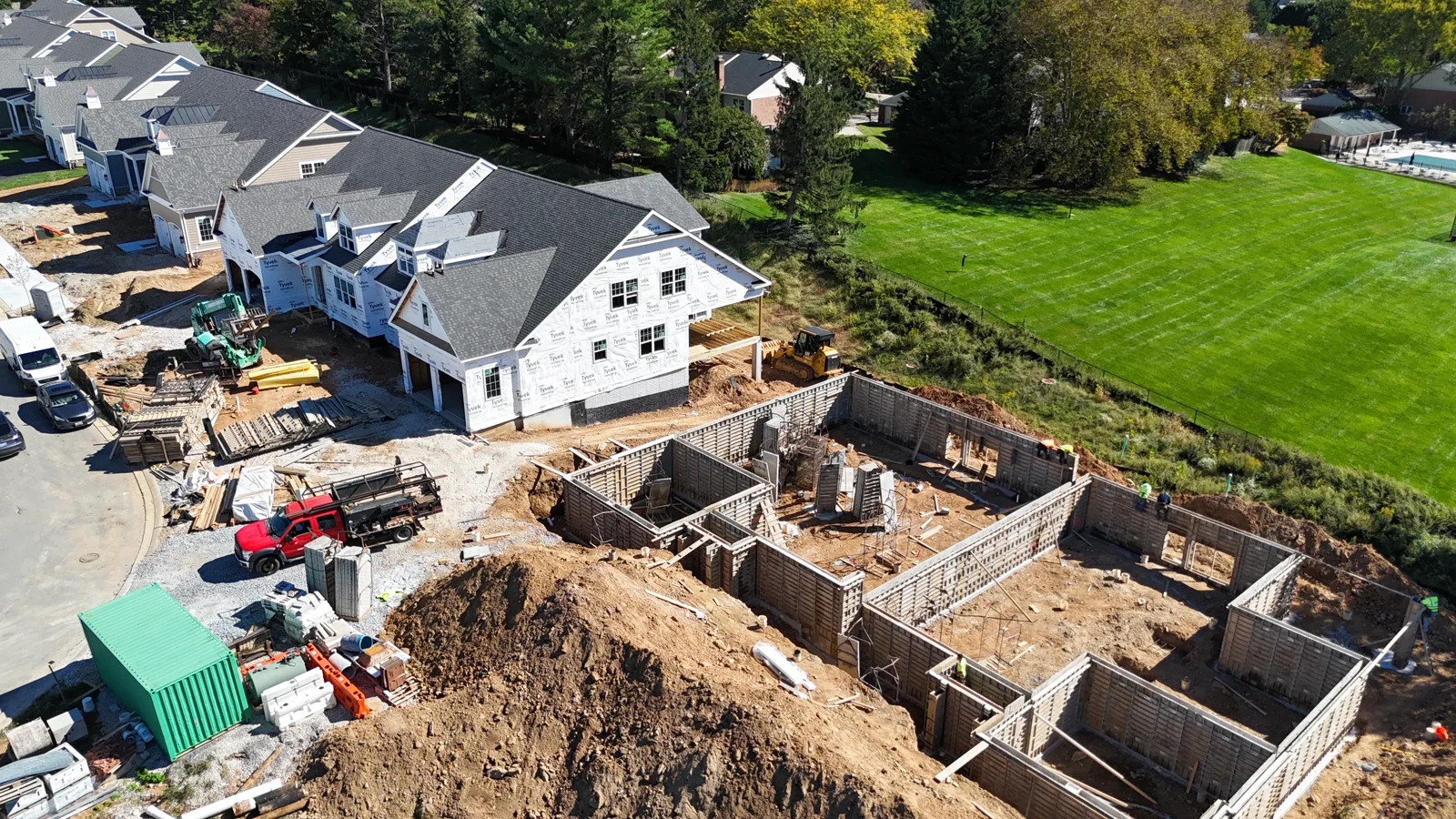Aerial view of construction progress and nearby landscape
